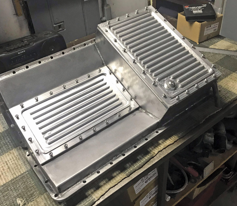 two oil pans in one large custom steel pan