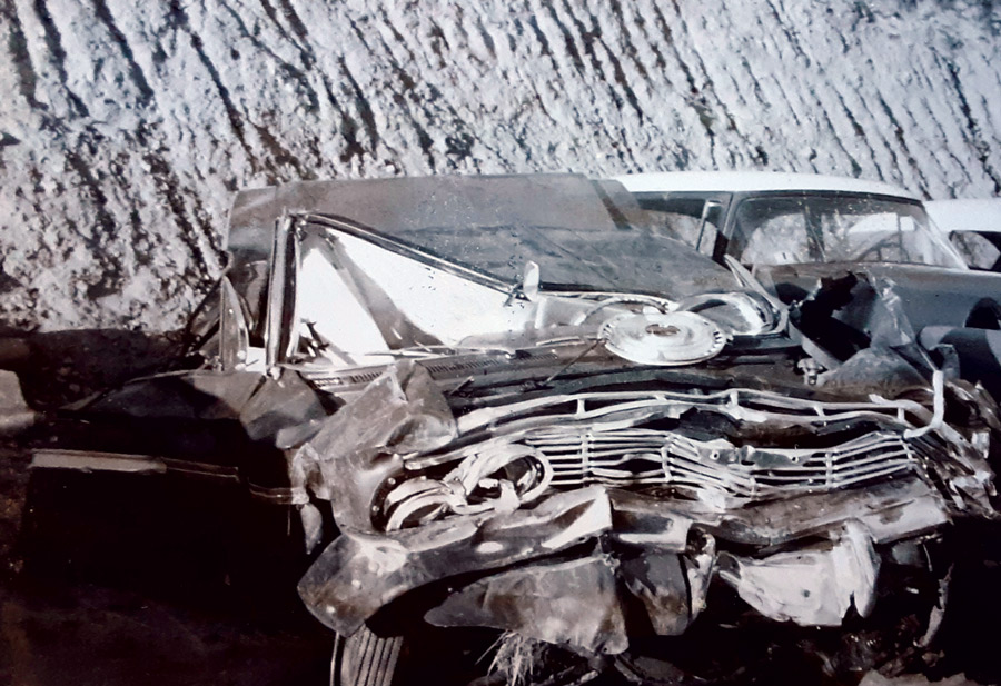 This black-and-white print from a Polaroid Instamatic camera depicts another sadly abused 1961 Impala