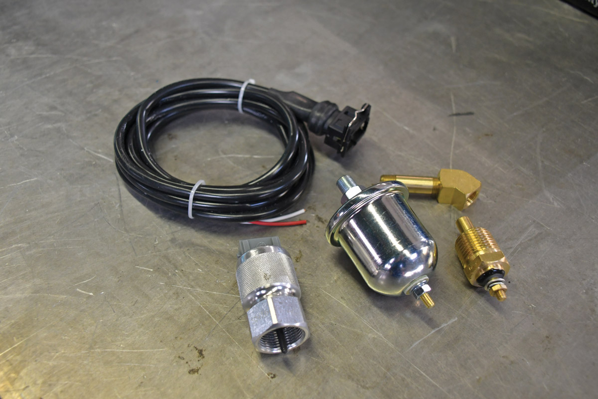 The sensor wire and SN16 transmission adapter for the new oil pressure and temperature gauges