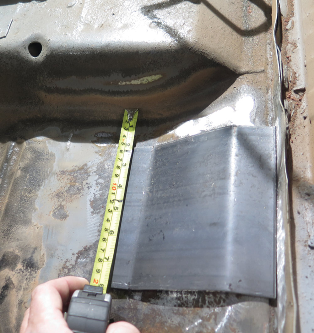 a plate is measured and modified to fit car's floor