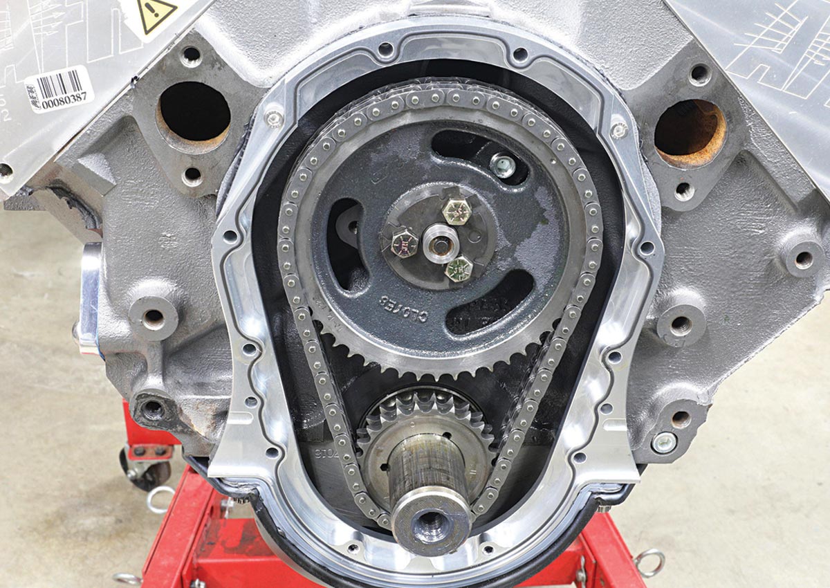  a big-block Chevy engine with a Torrington-style cam button installed in the timing gear