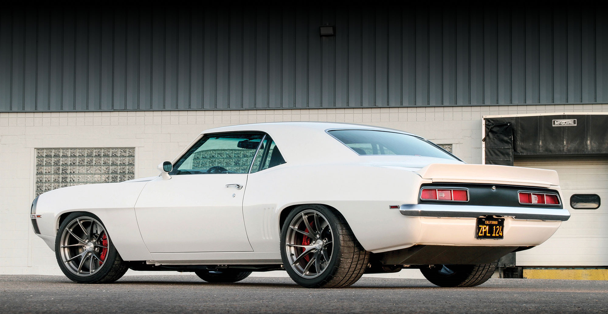 1969 Camaro side profile with building in background