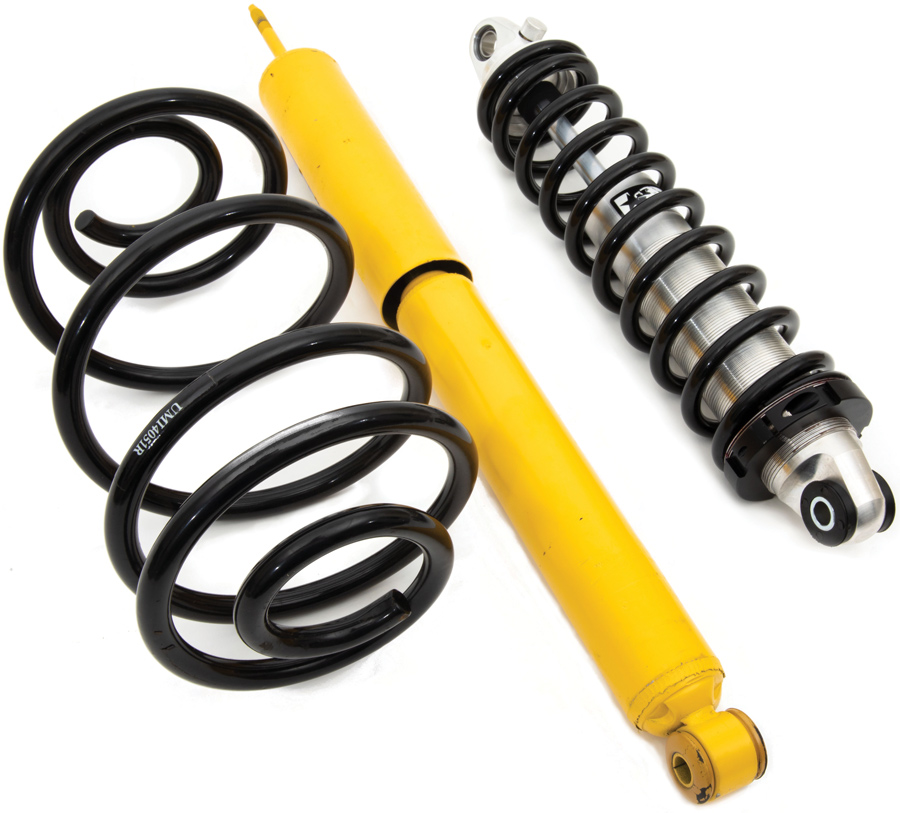 OEM coil spring and shock on the left, with the replacement Aldan American coilover on the right