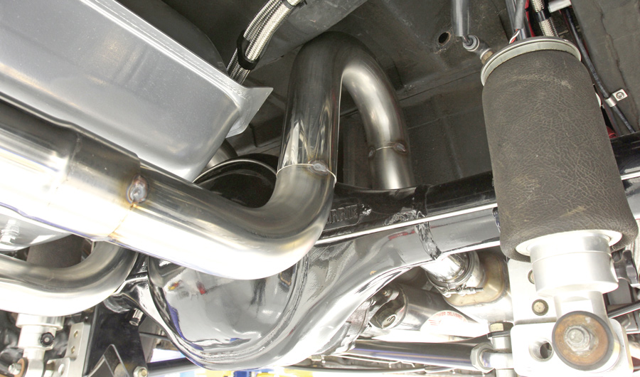 short 90-degree elbow is used to route the exhaust under the gas tank