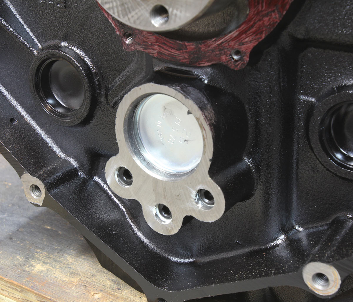 close up of plugged galley holes and camshaft end plug installed