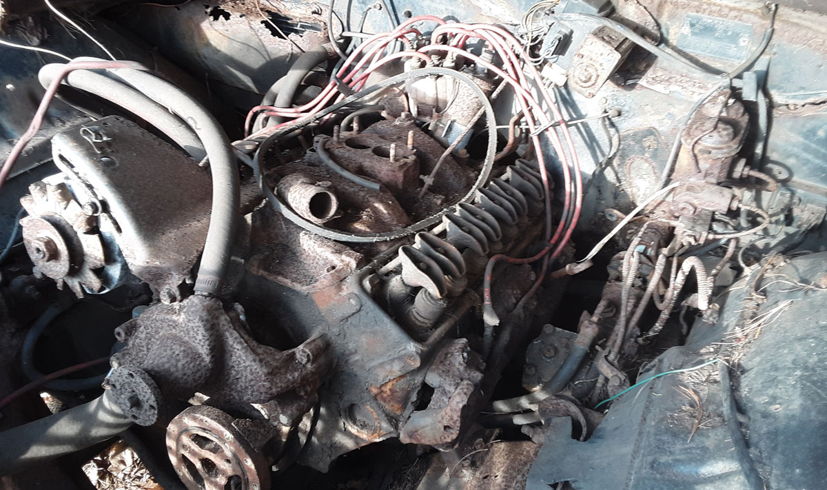 Missing its Rochester two-barrel carburetor, the original 307 remains underhood