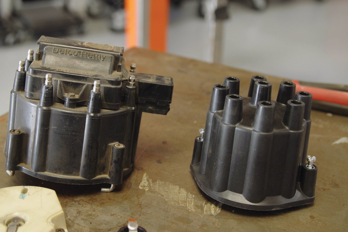 9: For comparison, here is the old HEI distributor cap compared to the original 1969-style Duralast replacement