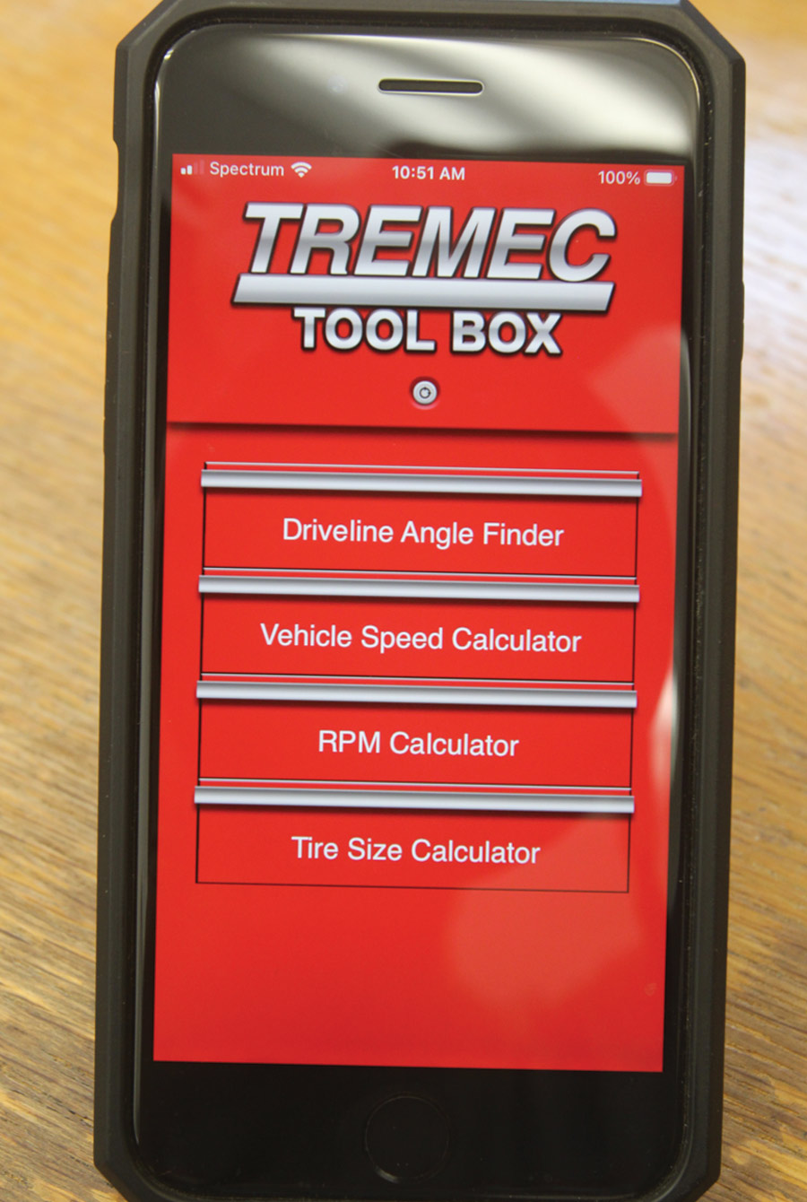 a smartphone displaying the TREMEC app