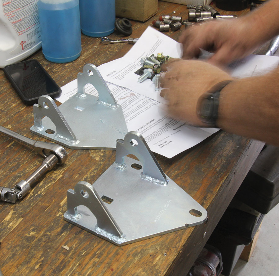 clamshell frame mounts bolt in place of the factory frame mount