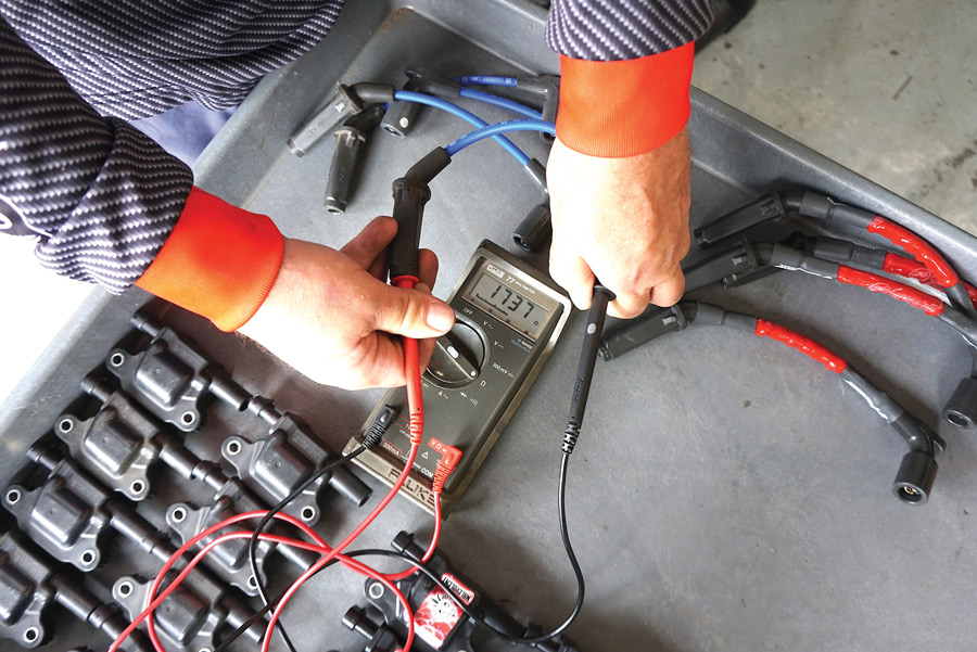 J.R. connected the factory spark plug wires to an ohmmeter