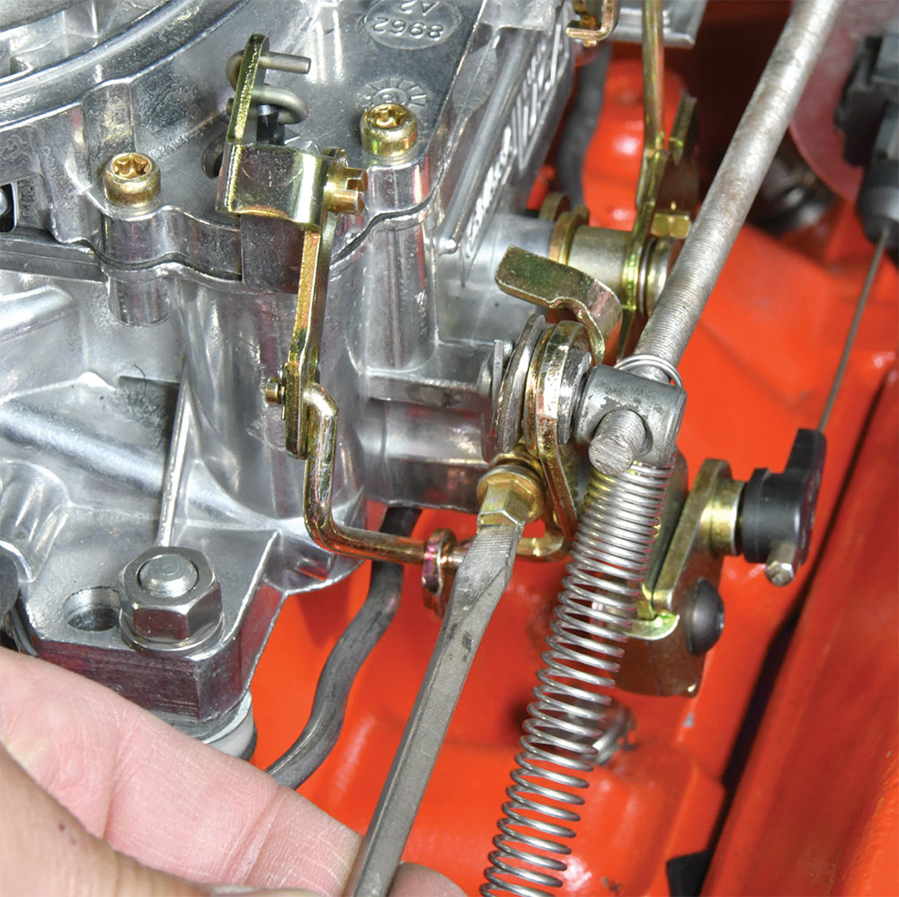 Closeup of adjusting the idle speed screw