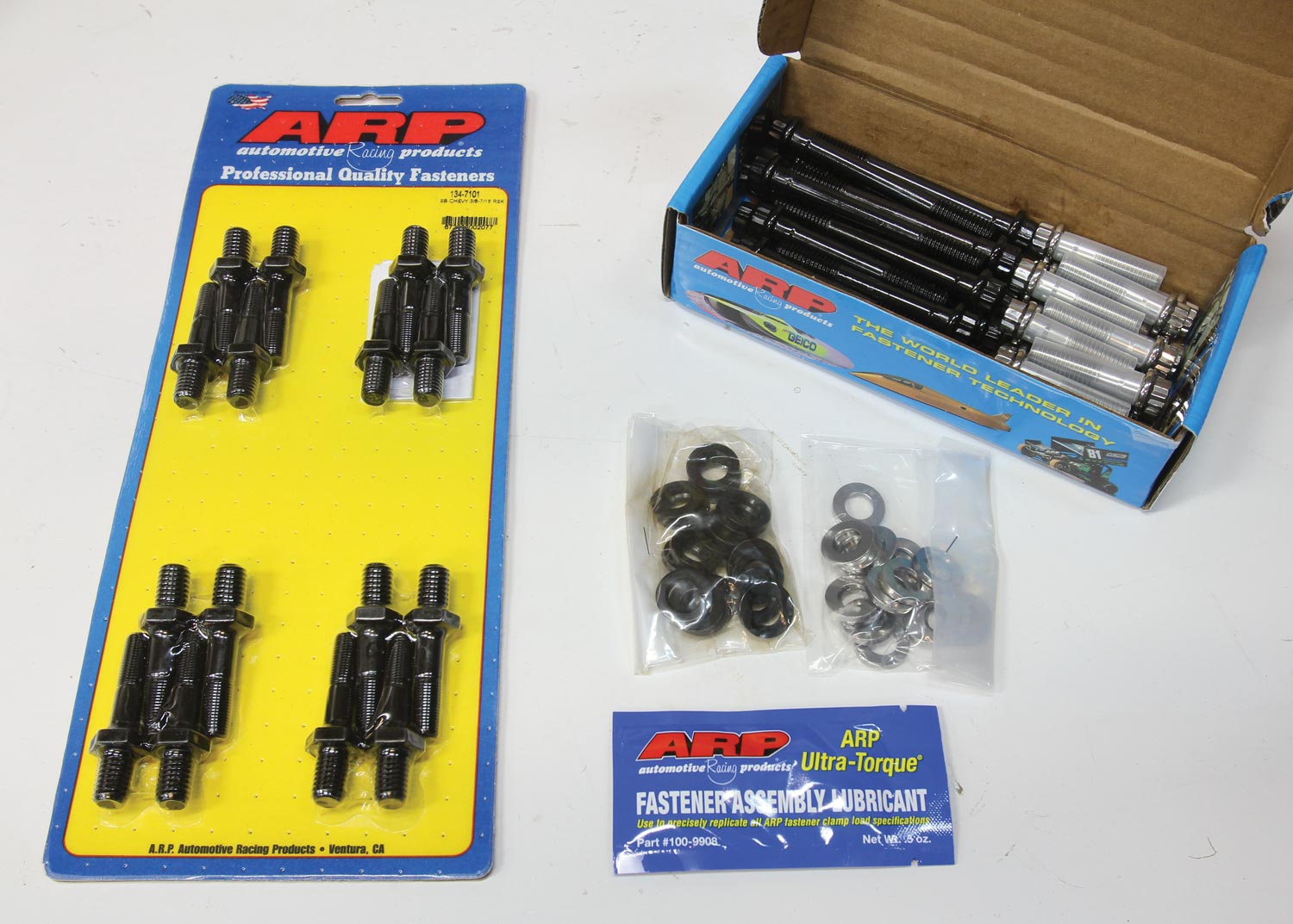 Automotive Racing Products cylinder head bolt kit (PN 134-3703), rocker arm studs (PN 134-7101), and Comp Cams pushrod guides (Summit PN CCA-4808-8)