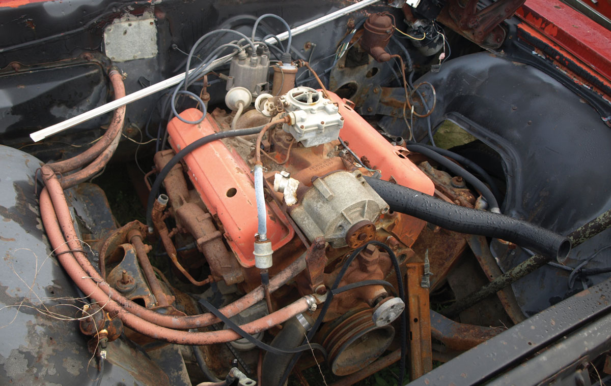 The aluminum unit that resembles an alternator is actually the beltdriven (missing) K19 A.I.R. (Air Injection Reactor) rotary vane-style smog pump