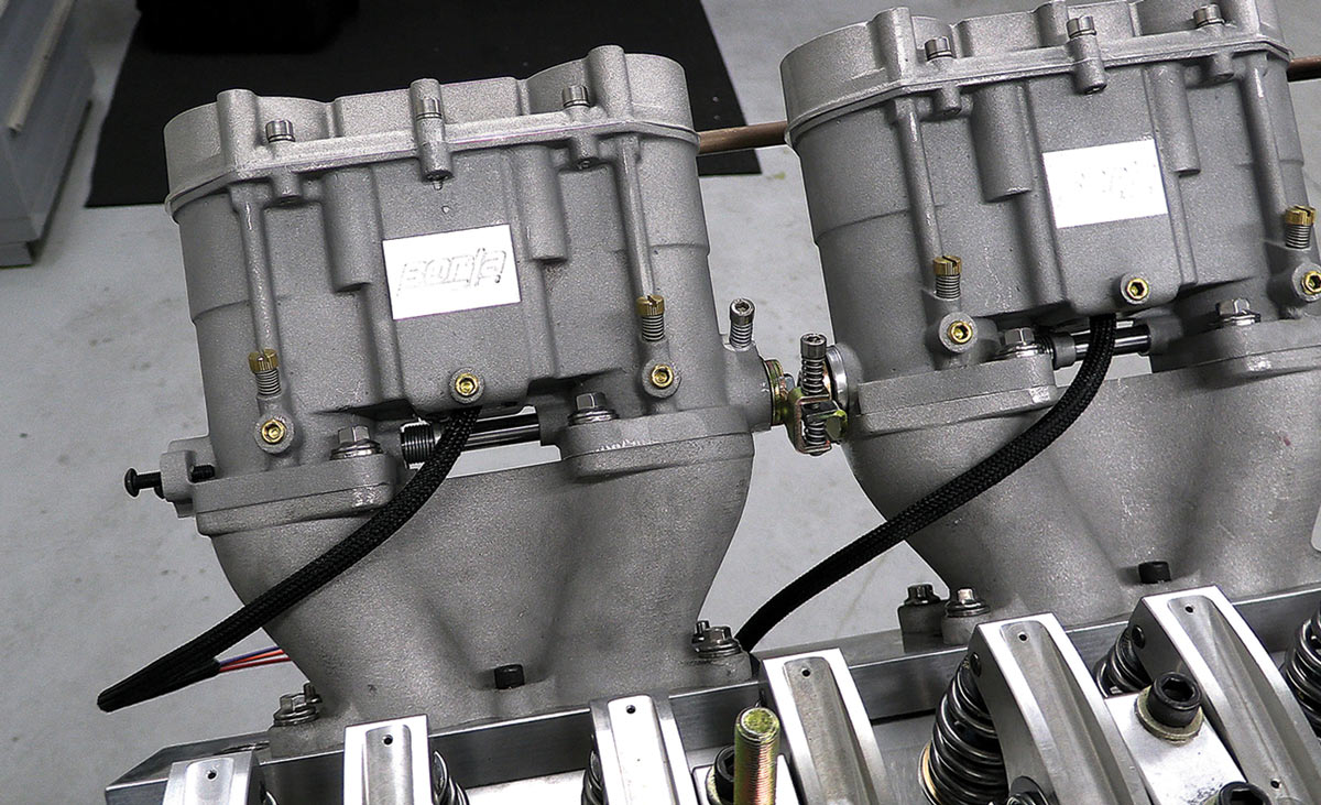 six Borla throttle bodies designed to look like old-school Weber carbs