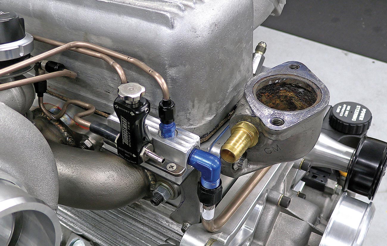 the engines hard lines that route oil through this manifold and to the two turbos, along with the Turbosmart adjuster