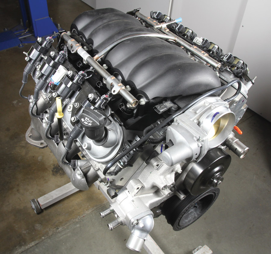 Here’s our crate LS3 engine as it shipped from Chevrolet Performance. As far as nostalgia goes, it’s woefully lacking that aesthetic—but we’ll fix that