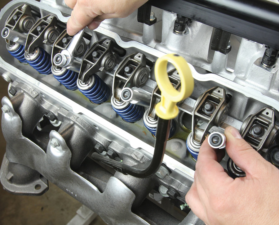 The aluminum stand-offs install using the same threaded holes as the stock LS valve covers. Note the O-rings that provide proper sealing.