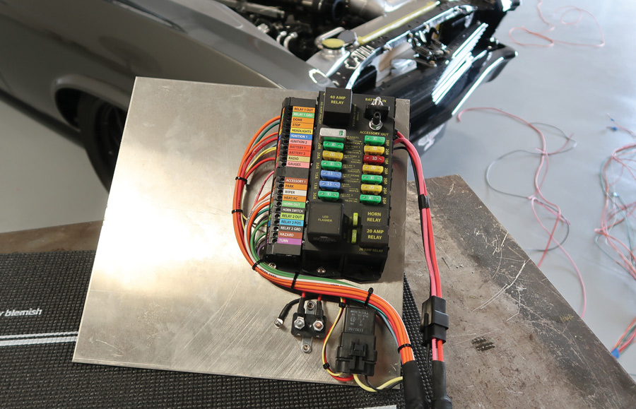 The Highway 22 fuse panel has labeled connection points and all fuse ratings and locations are clearly identified. A turn signal flasher, horn relay, and additional relays for accessory items are included.