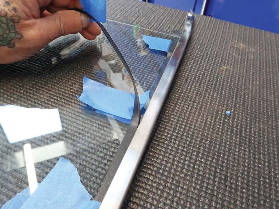 Once the framework is in place, the excess setting tape is trimmed off. 