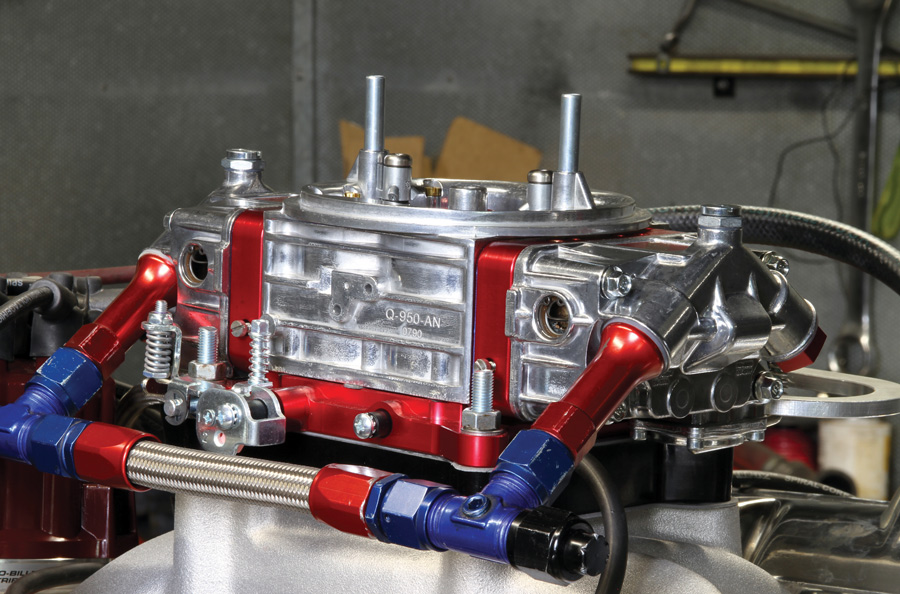The carburetor is a Quick Fuel–modified Holley rated at 950 cfm. The Quick Fuel claim to fame is annular fuel boosters, which feature a number of very small discharge holes designed to optimize atomization, which can enhance low-speed responsiveness and performance. 