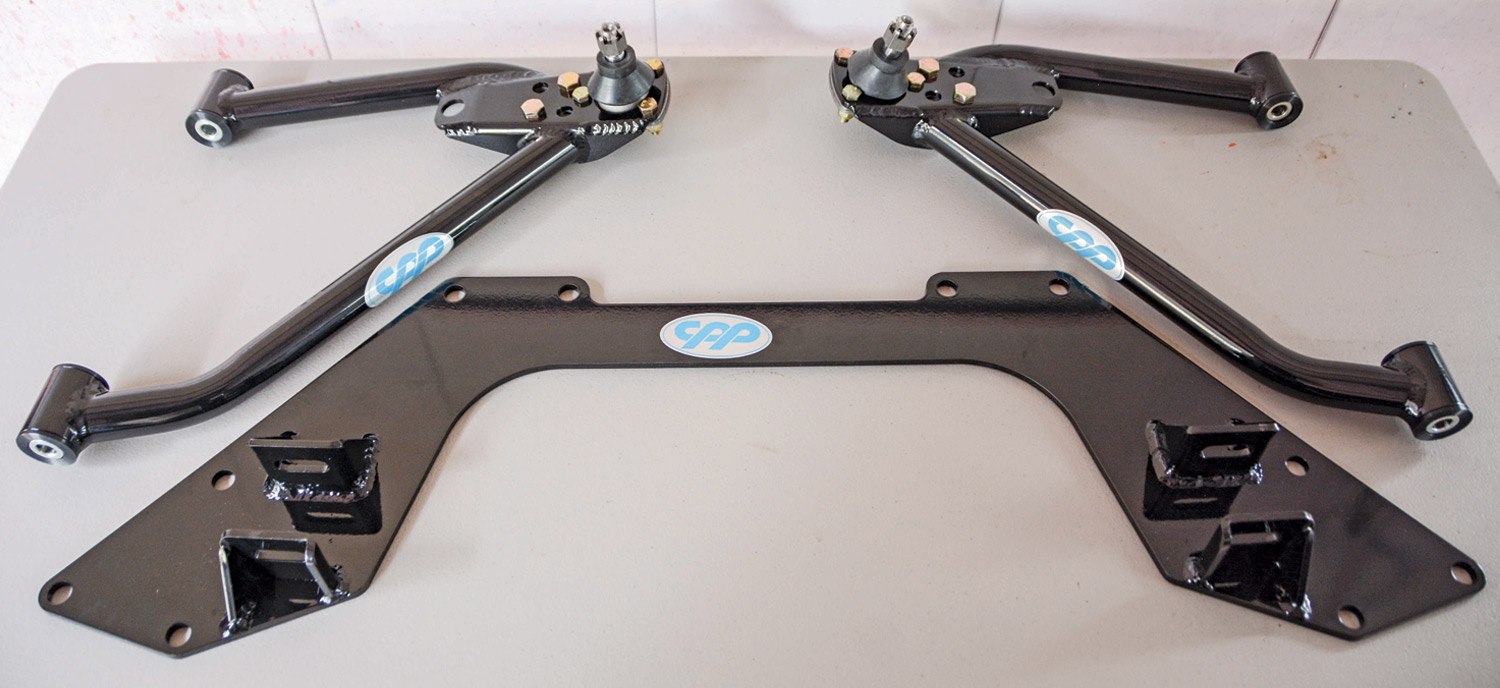part from CPP’s 6267TCA-KB MINI Sub-Frame kit laid out on a table