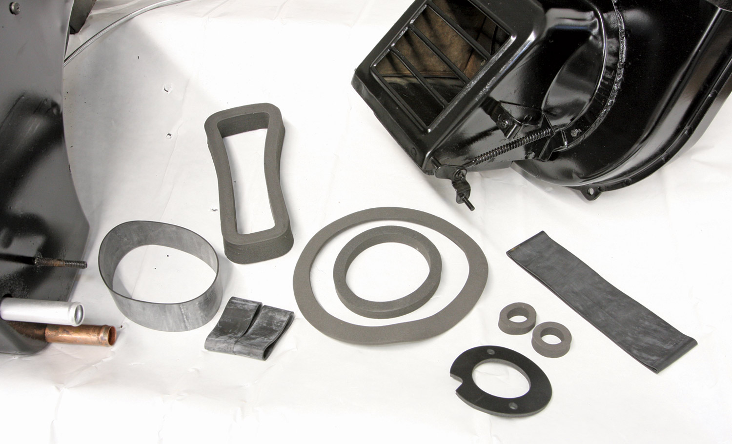 parts from a Danchuk’s Deluxe Heater Seal Kit (PN 322) laid out on a table