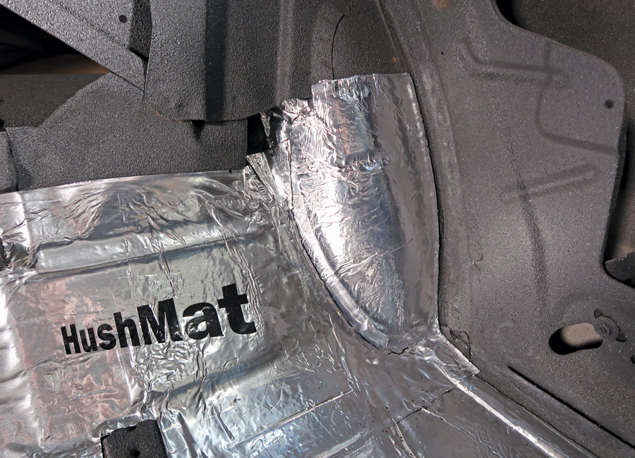 As HushMat Ultra is easily formed a small piece was shaped to follow the contour of the wheelhouse and blends into the floor section. 