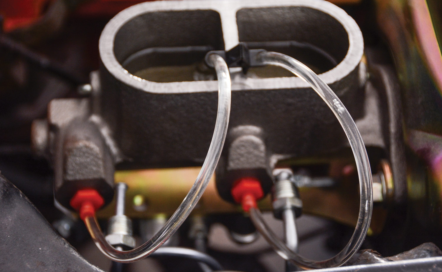 CPP’s bench bleeding kit, including plastic fittings, clear lines, and a small clamp, incorporated into the master cylinder