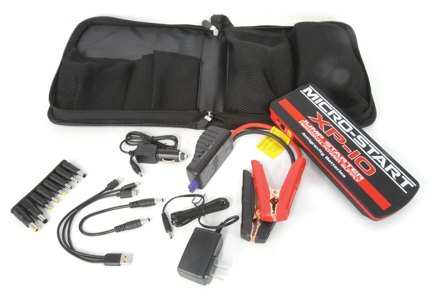the Micro-Start XP-10 kit including the battery pack, specific jumper cables with 6 AWG cables, adapters to charge numerous laptops and cell phones, along with a home charging adapter and cigarette lighter adapter to charge the unit in the car
