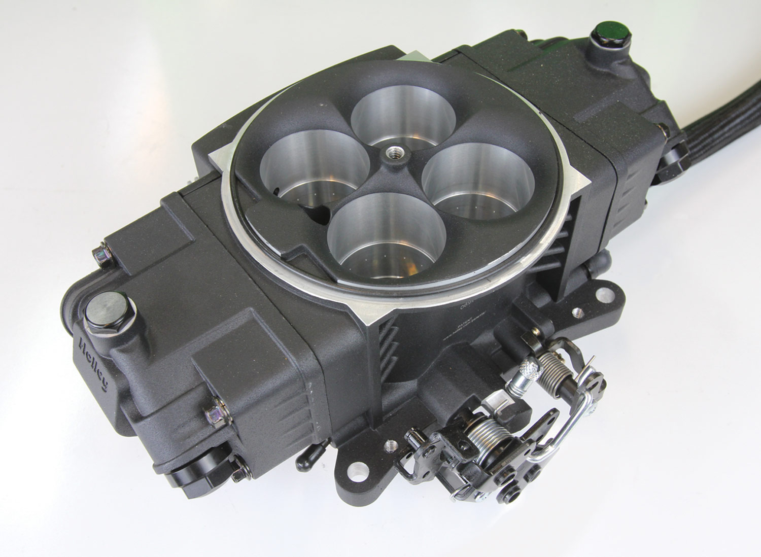 an aftermarket four-barrel throttle body-type EFI system from Holley Performance