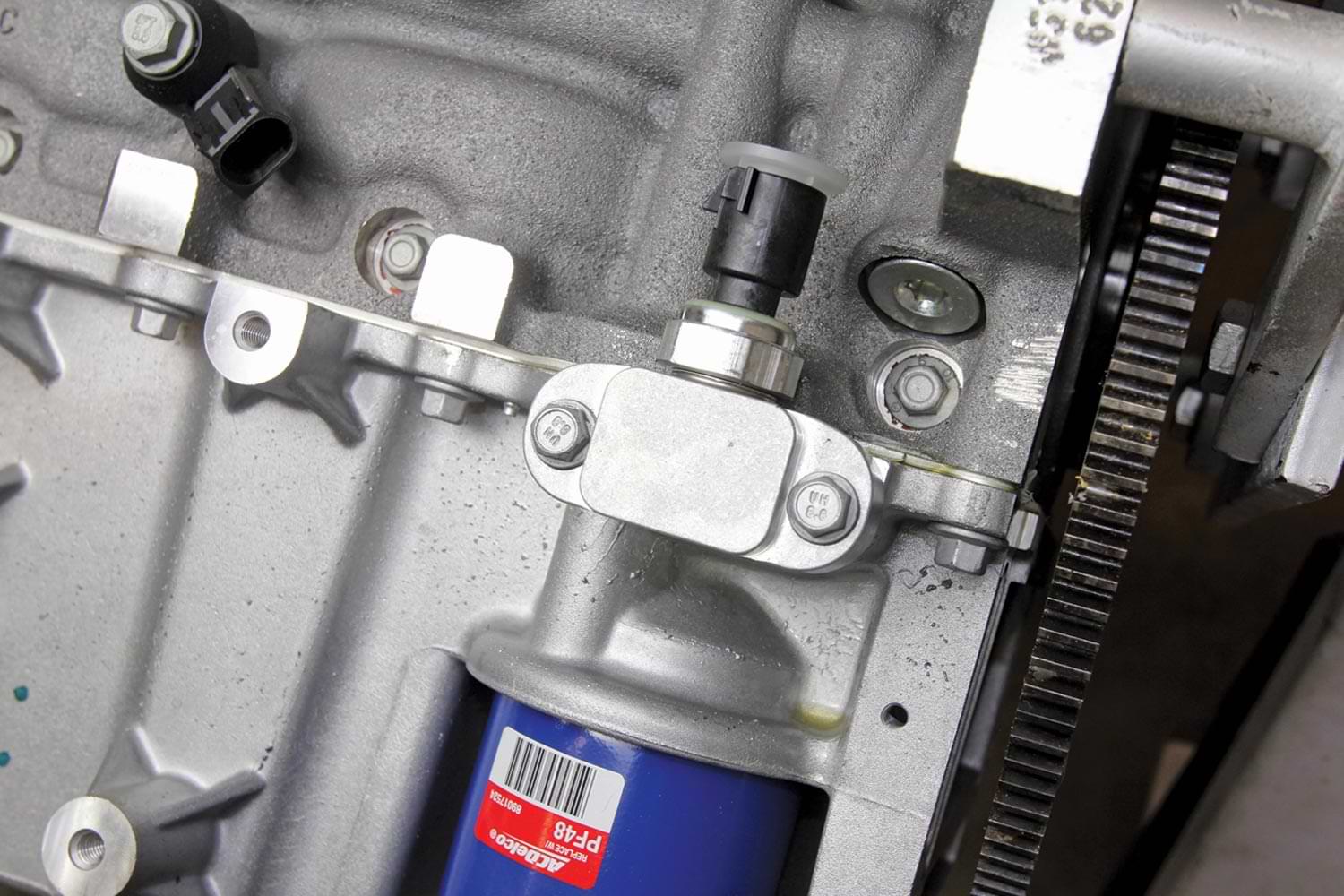 view of the port at the top of the rear of the block that accepts an oil pressure sensor