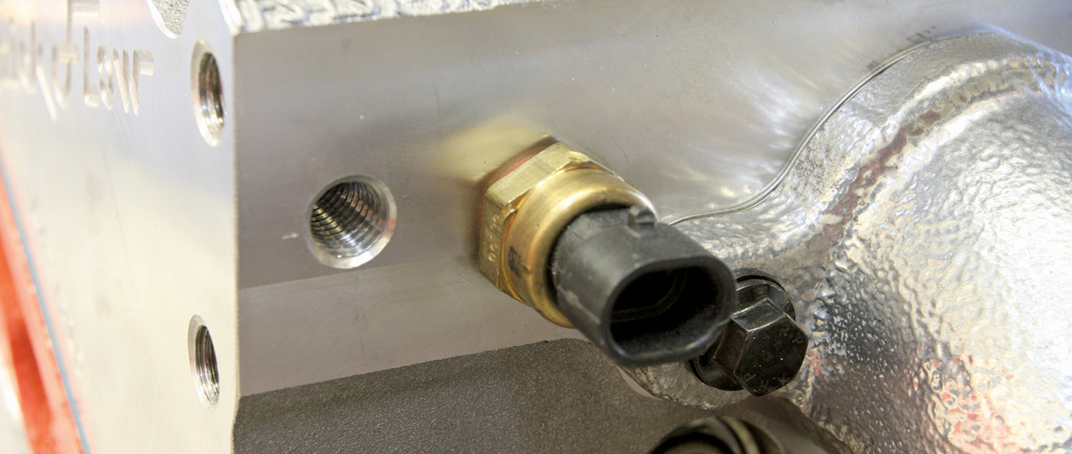 mounting area for a Coolant Temperature Sensor (CTS)