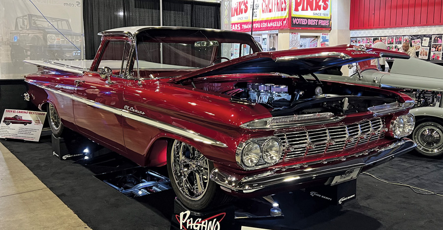 Red car with hood open