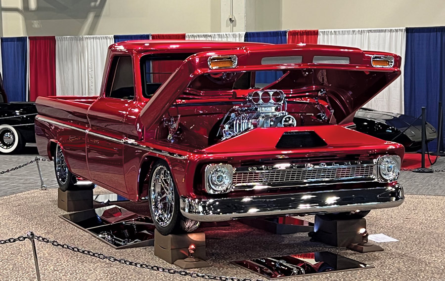 Red truck with hood open