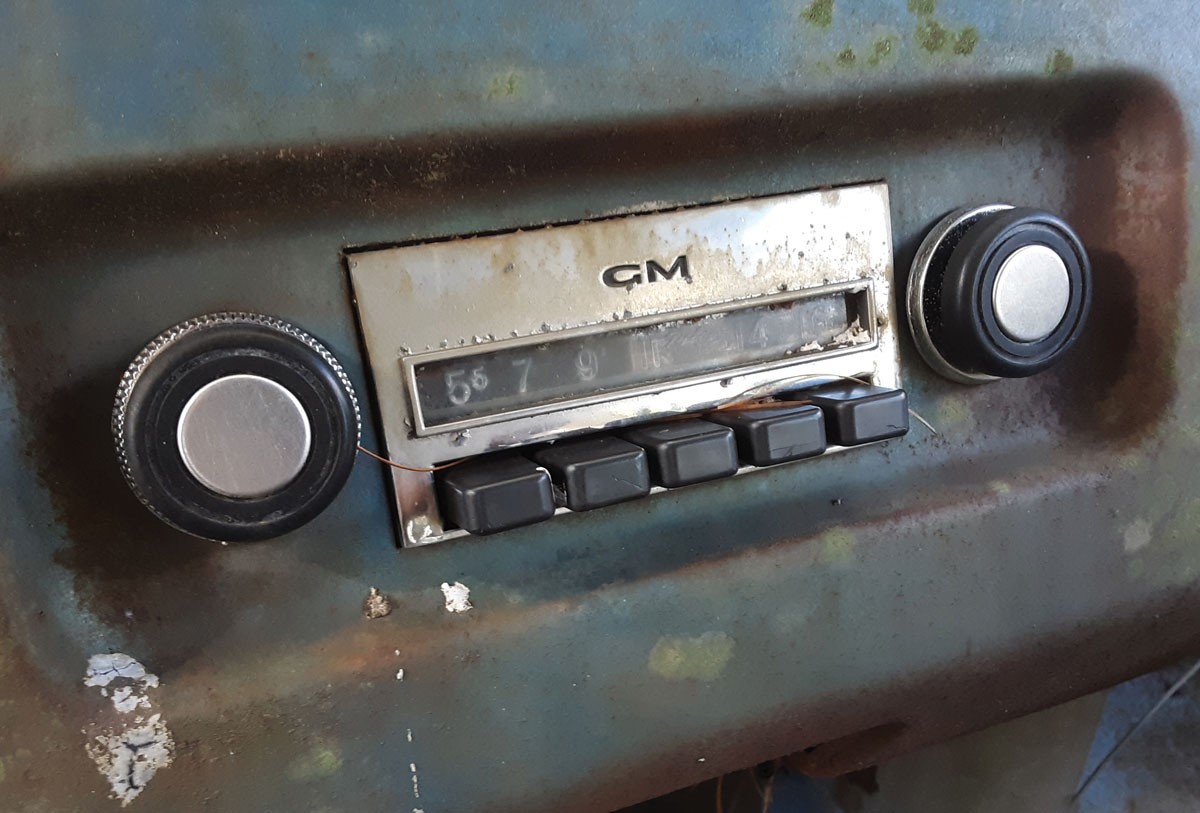 A far cry from today’s world of OnStar, Bluetooth, and WiFi technology, this factory AM radio added $69.95 to the tab and triggered the installation of an antenna mast to the driver side front corner of the cab; a simple relic from simpler times