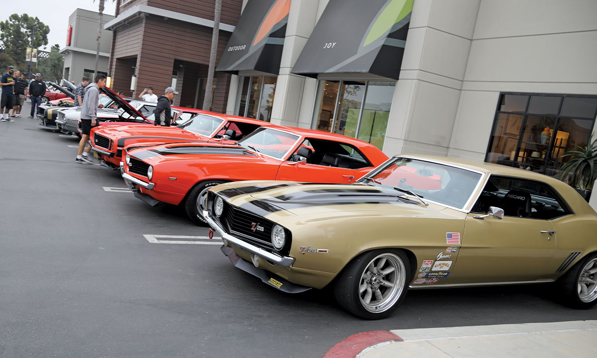 a line of Chevy muscle cars at Southern California’s Quarantine Cruise