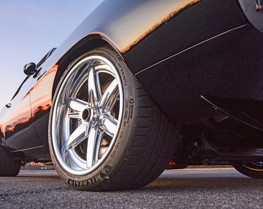 black '69 Camaro tire and rim closeup