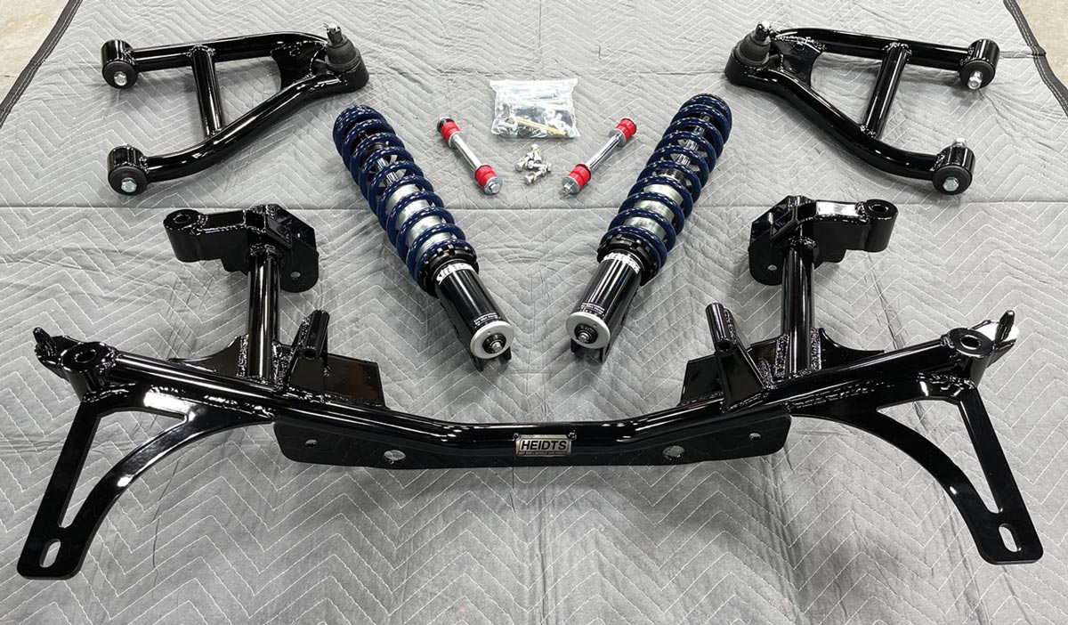 parts for the upgrade, including a new tubular K-member with matching lower control arms and sway bar links from Heidts, along with a pair of Strange Engineering double-adjustable coilover struts with Hyperco springs