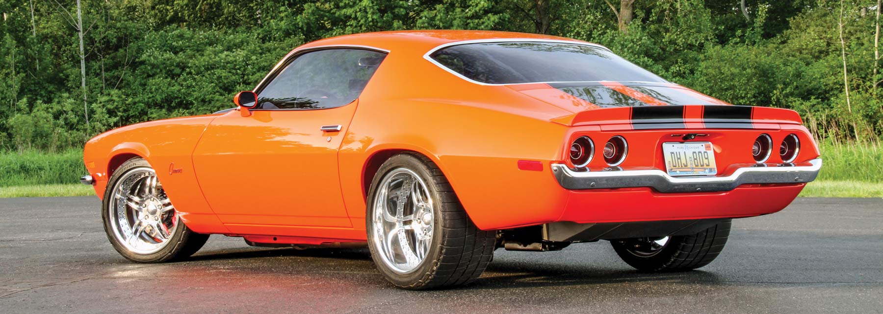 rear of an orange '70 Camaro