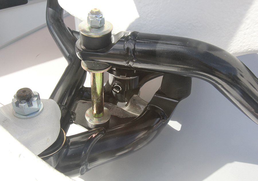 typical connection between a front sway bar and the lower control arm