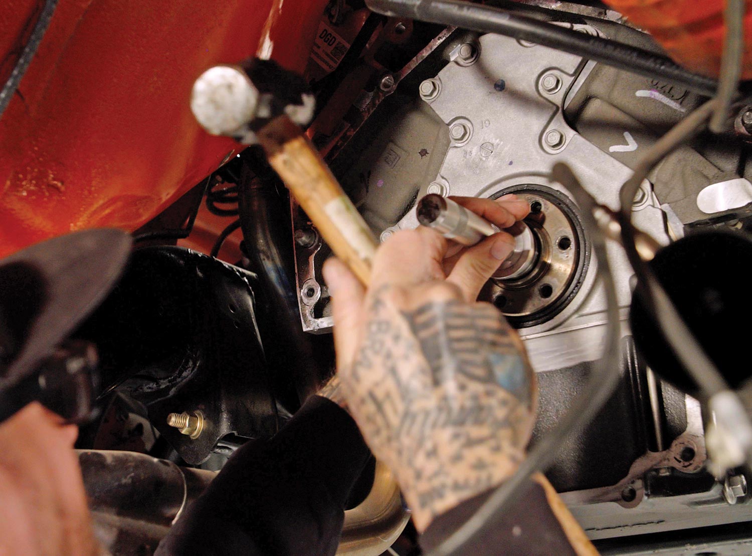 mechanic installs the sealed roller bearing used with an aluminum bellhousing