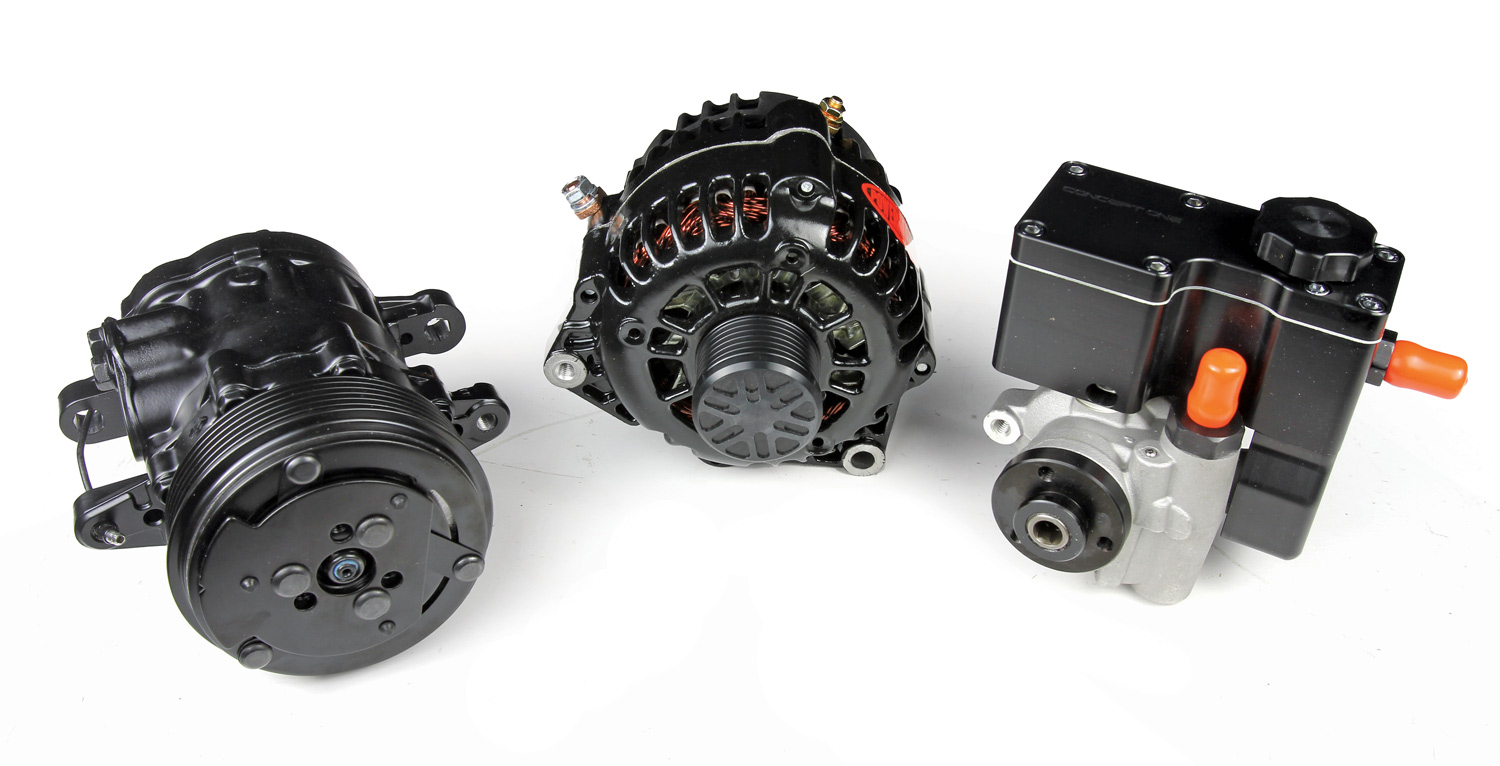 from left is a compact Sanden SD7 A/C compressor, Powermaster 165-amp CS130D alternator, and a Lares Corporation aluminum power steering pump with integrated Concept One billet mini reservoir
