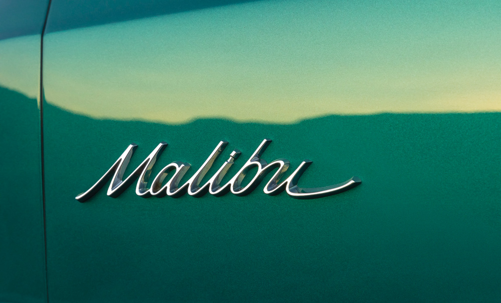 "Malibu" script badge on fender