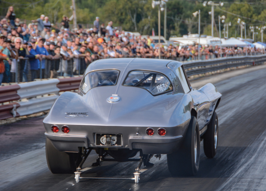 rear view of grey hot rod during race