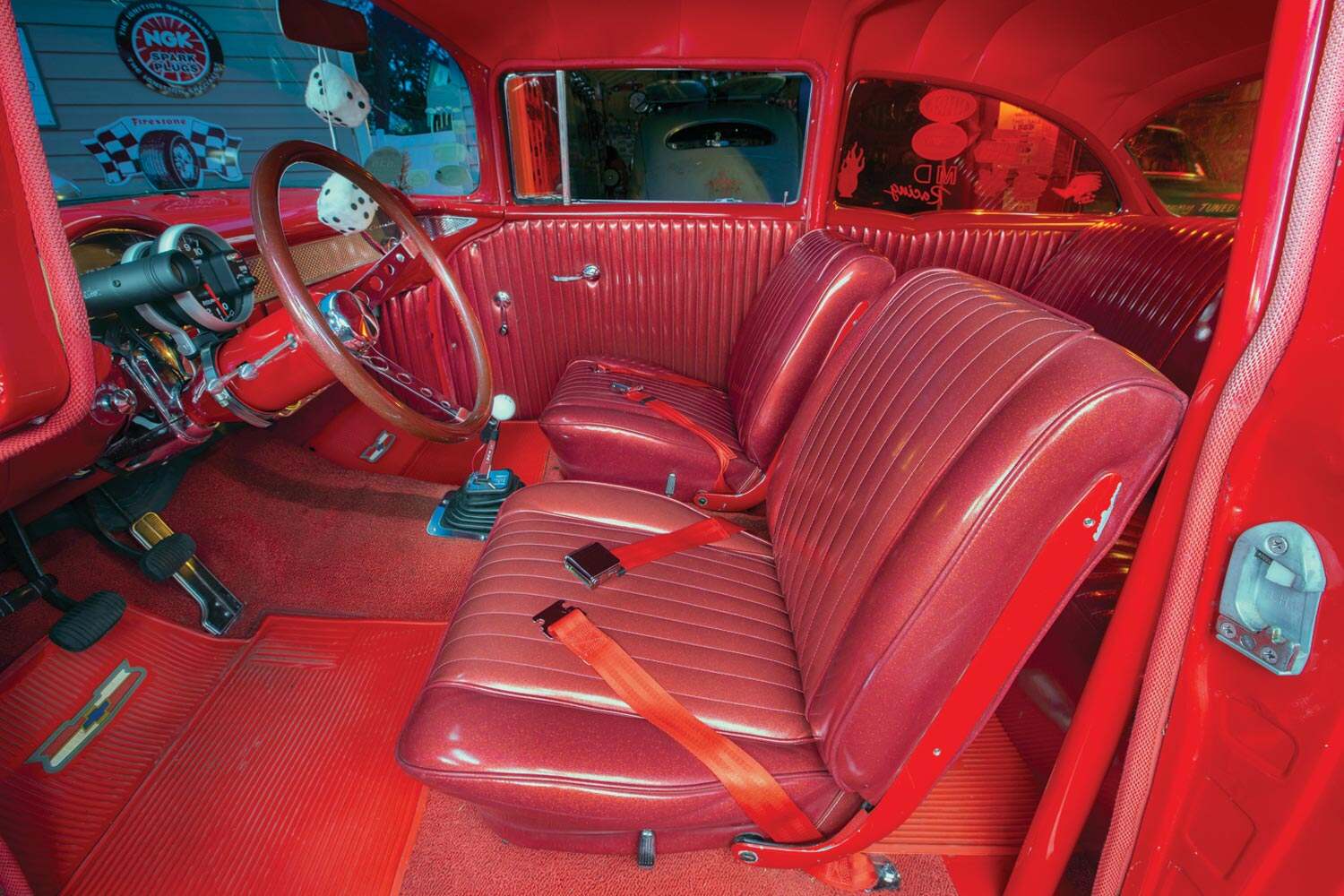 driver's side view of the '55 Chevy gasser's all red interior