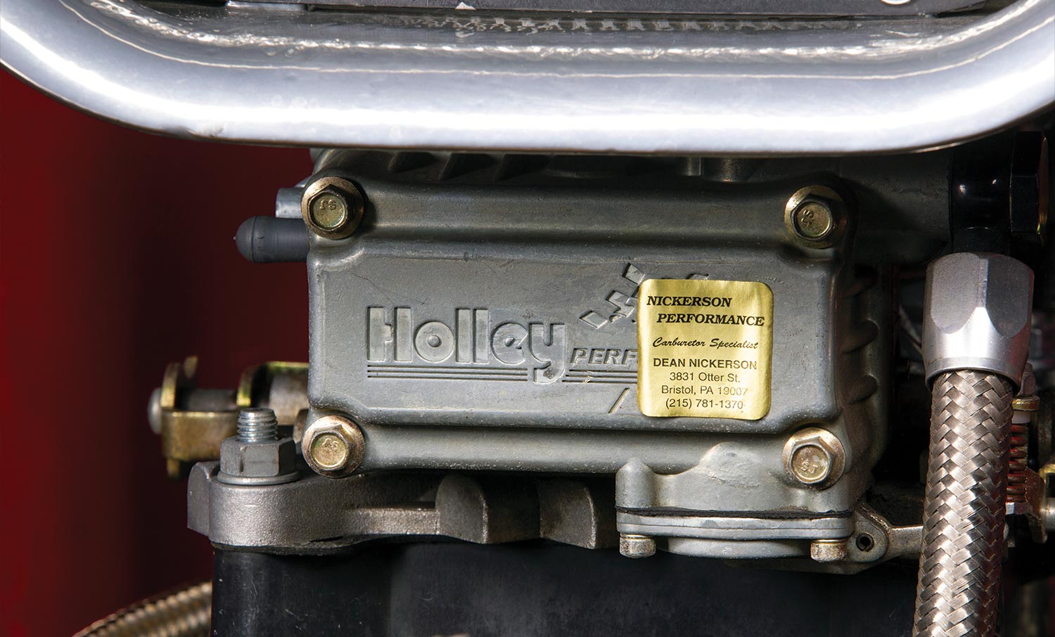 close view of a Holley performance part on the '55 Chevy gasser