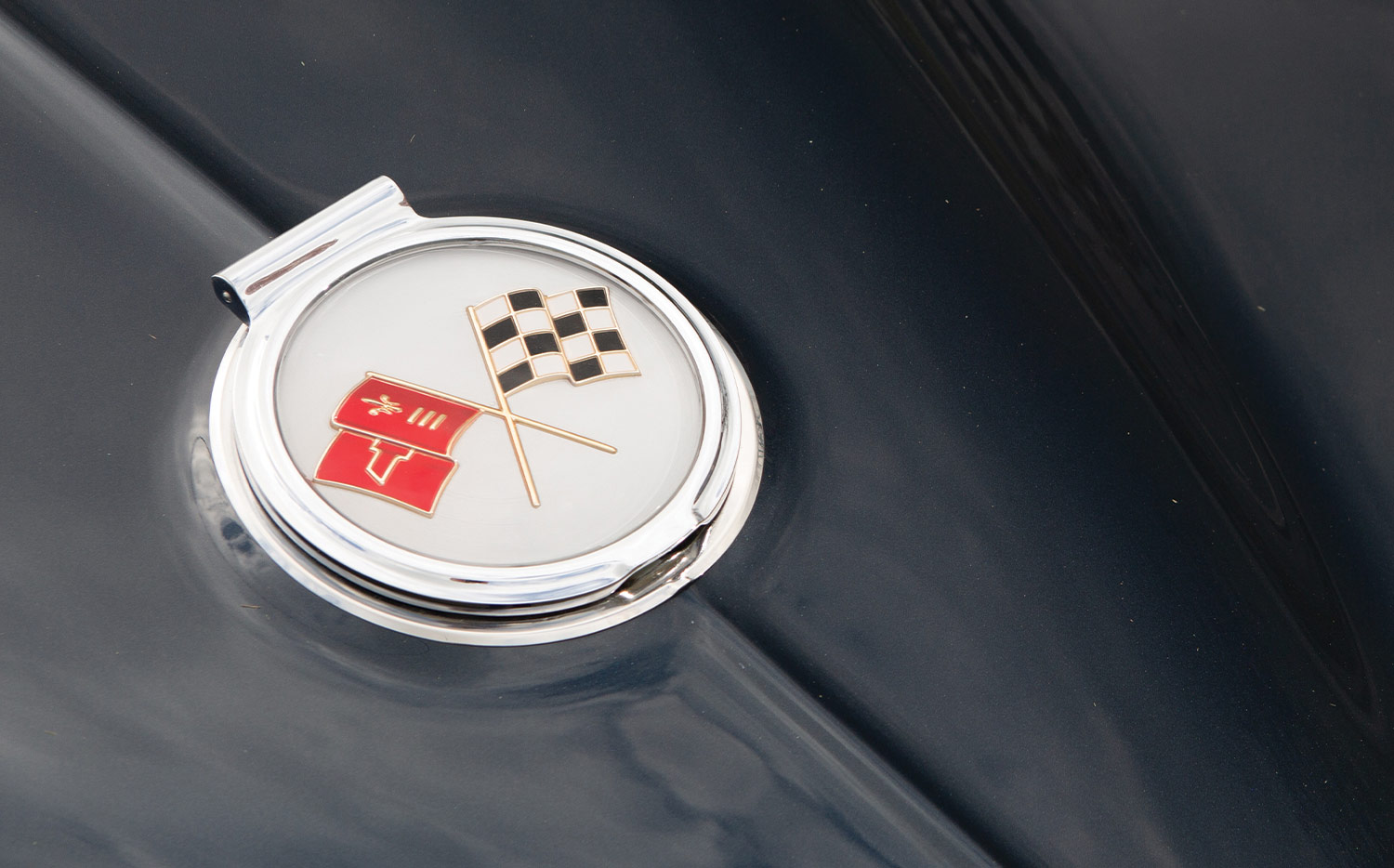 close view of the classic Corvette emblem on the '63 Sting Ray's gas tank cover