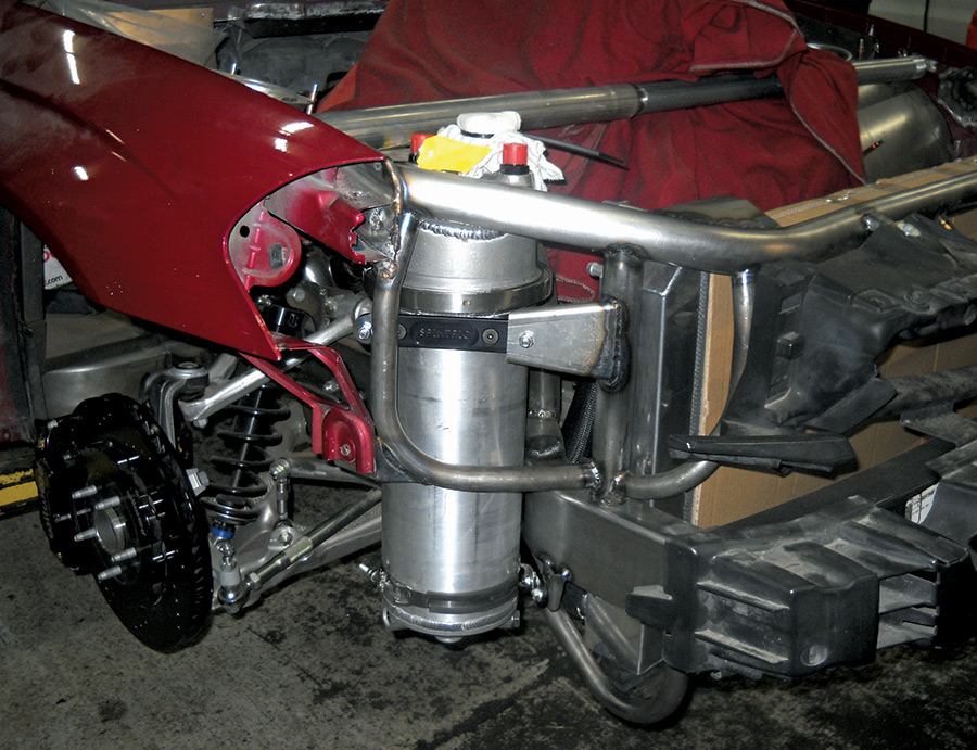 A dry-sump oiling system will live in the right-front corner of the engine compartment.