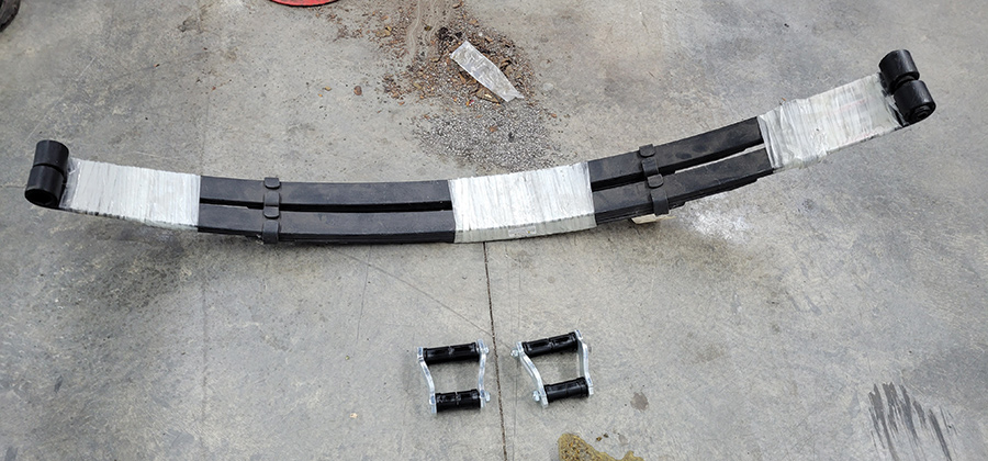 In the rear of the wagon new springs with five leaves were installed. They use rubber bushings in the front eyes and shackles with poly bushings in the rear.