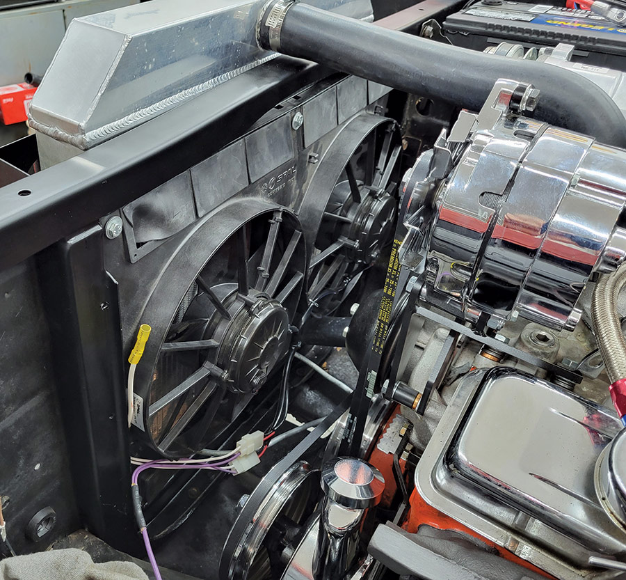 To keep engine operating temperatures under control, Srbinovich installed dual electric fans with a shroud from Vintage Air.